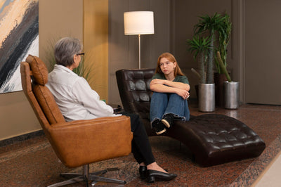 dark blue recliner chair